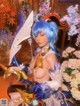 A woman with blue hair holding a sword in her hand.